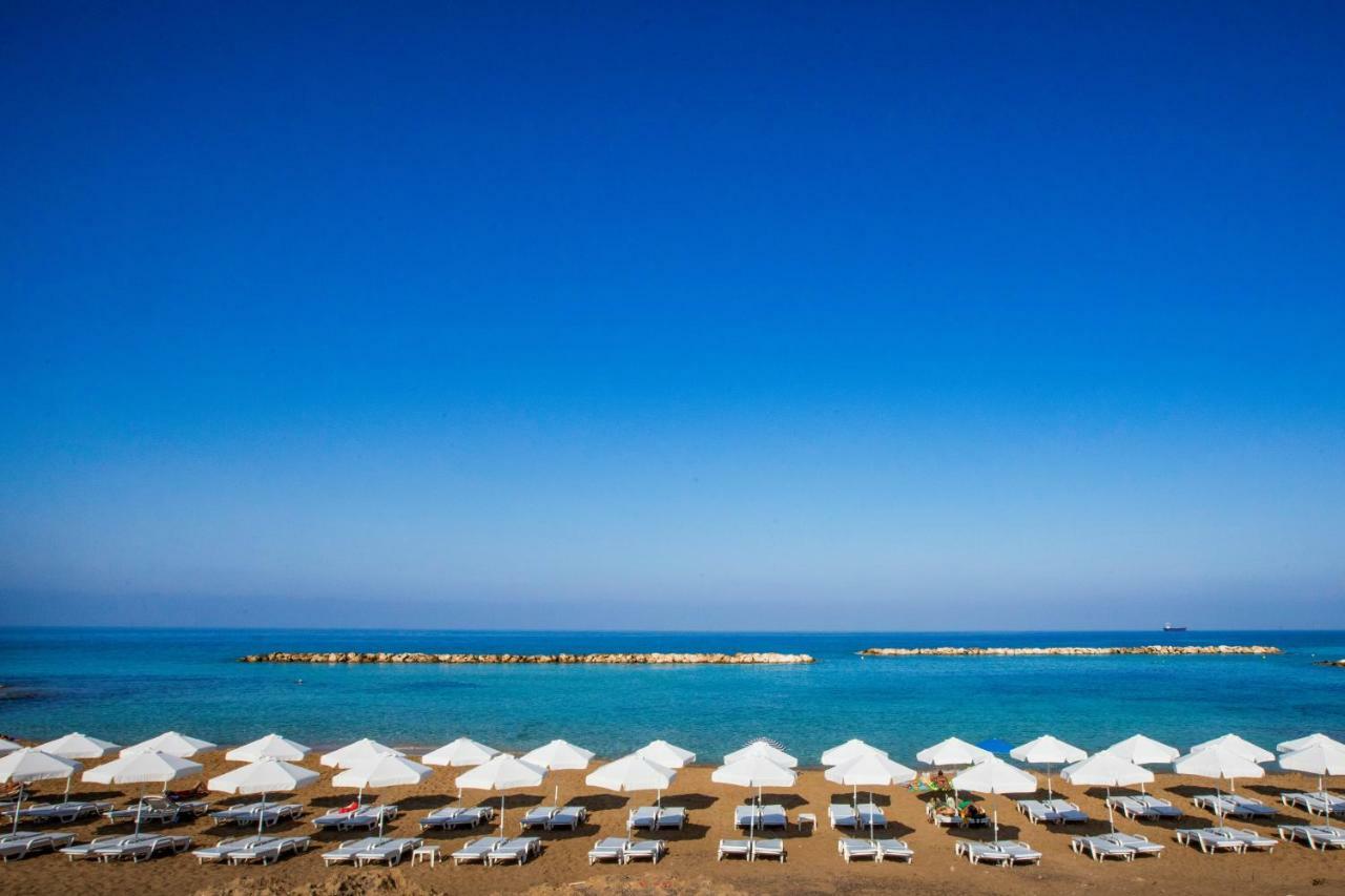 Venus Beach Hotel Paphos Exterior photo The beach of the Grand Hotel