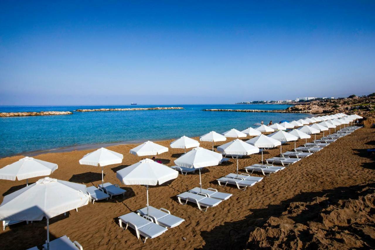 Venus Beach Hotel Paphos Exterior photo A beach in Nissi Beach