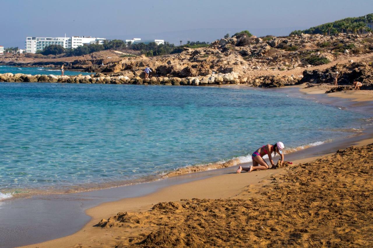 Venus Beach Hotel Paphos Exterior photo A beach in Cyprus